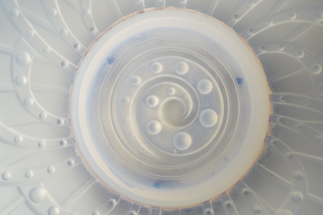 J Landier, a French Art Deco opalescent glass bowl on wooden pedestal base, 35cm in diameter